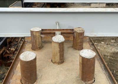 Fitzgerald Metal Works. Iron pegs sticking out between an iron board.