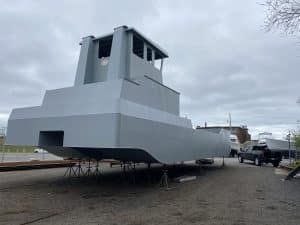 Fitzgerald Metalworks. A large catamaran-style barge vessel under construction