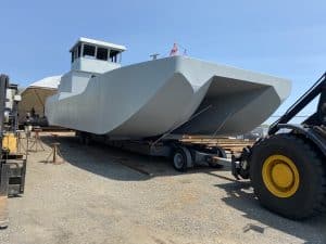 Fitzgerald Metalworks. A large catamaran-style barge vessel under construction