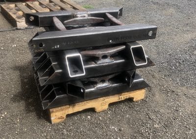 Fitzgerald Metalworks. A stack of fabricated metal parts placed on a wooden pallet.