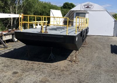 Fitzgerald Metalworks. A large industrial barge on stands outside