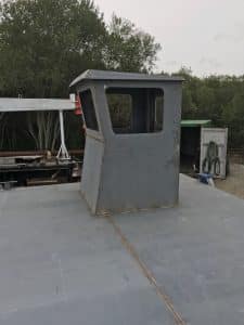 Fitzgerald Metal Works. metal boat cabin on a barge boat