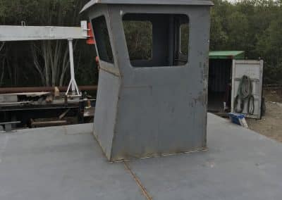 Fitzgerald Metal Works. metal boat cabin on a barge boat