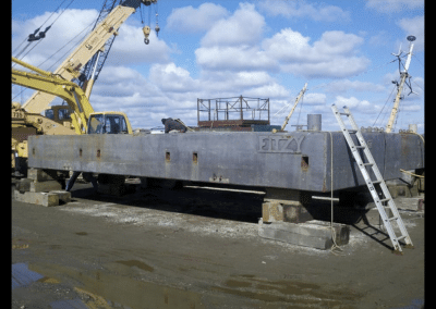 Fitzgerald Metal Works. Barge being worked on outside